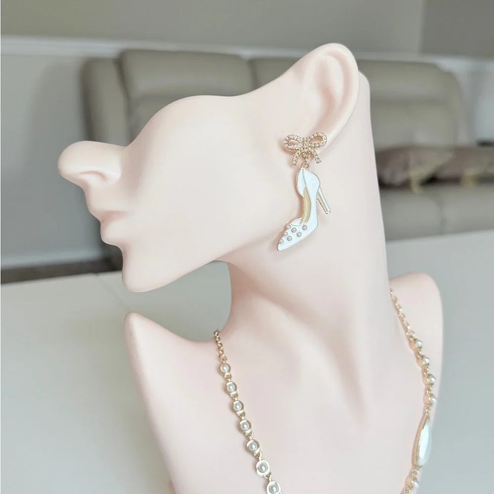 White Enamel High Heel Drop Earrings with Gold Bow